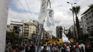 Workers of state hospitals take part in an anti-austerity rally in Athens, Wednesday, March 15, 2017. Hundreds of workers in the country's health system staged a rally opposing austerity measures which will affect their sector. (AP Photo/Yorgos Karahalis)